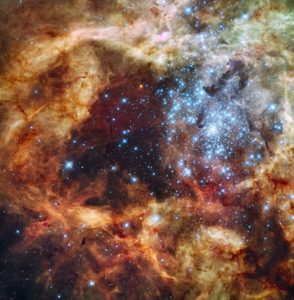 This close-up view of the Tarantula Nebula from Hubble shows a large star-forming region within the cloud. Credit: NASA/ESA