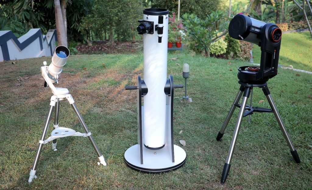 A refractor, dobsonian and an SCT telescope